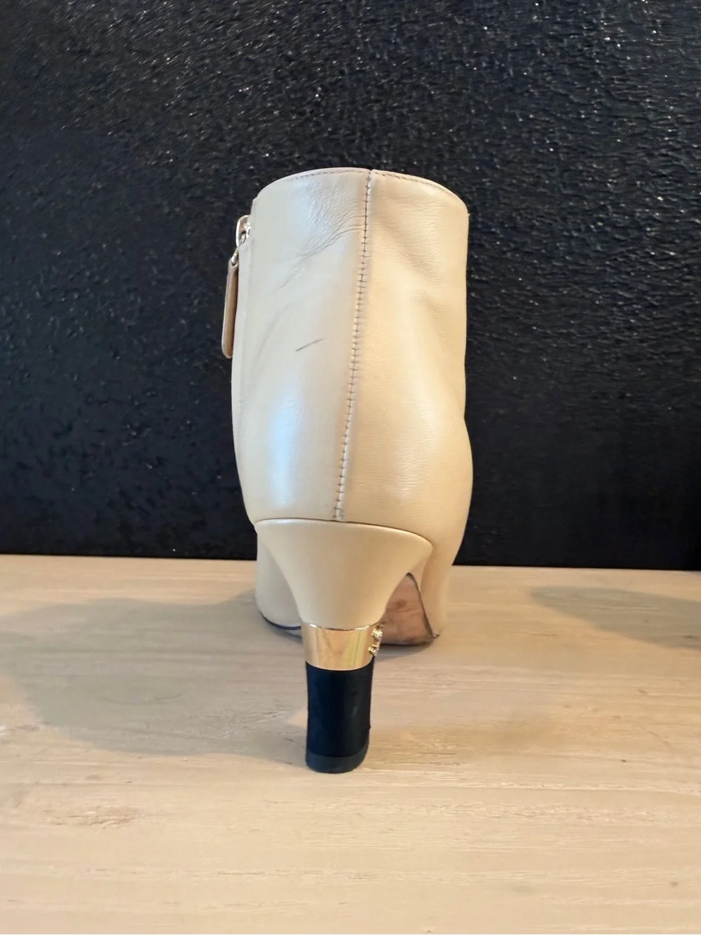 CHANEL Beige Leather Ankle Boots with Black Cap Toe